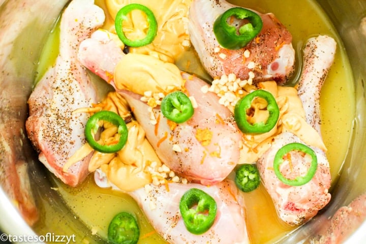 uncooked chicken and jalapenos in instant pot