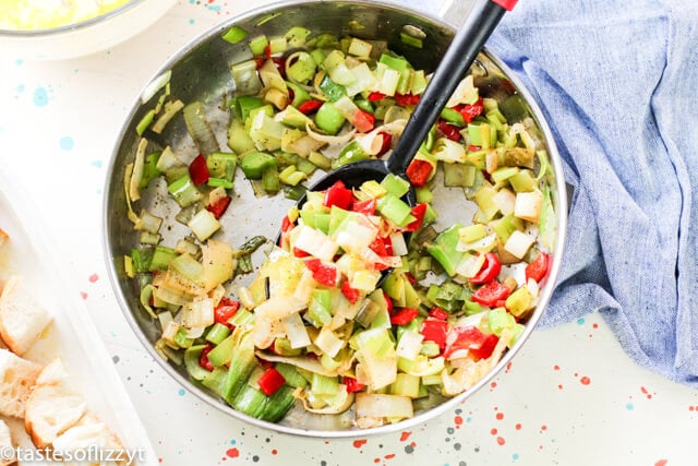 veggies sauteing in a skillet