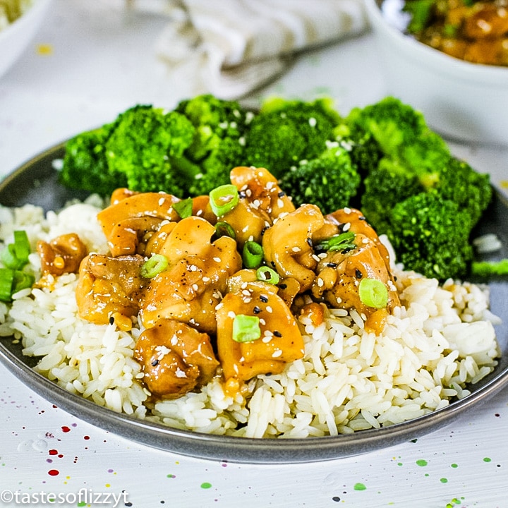 A plate of food with rice and broccoli, with Chicken and Teriyaki