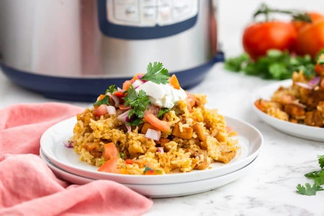 salsa verde chicken and rice on a plate