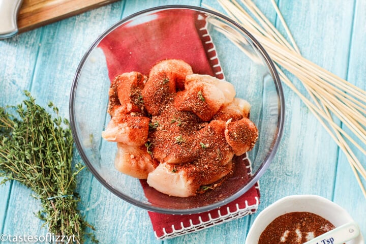 chicken and seasoning in a bowl