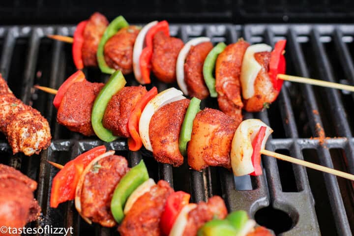 chicken skewers on a grill