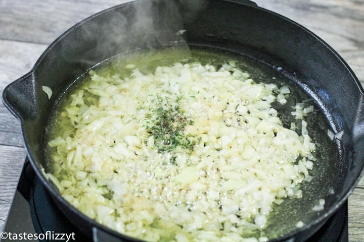 simmering onions in a skillet