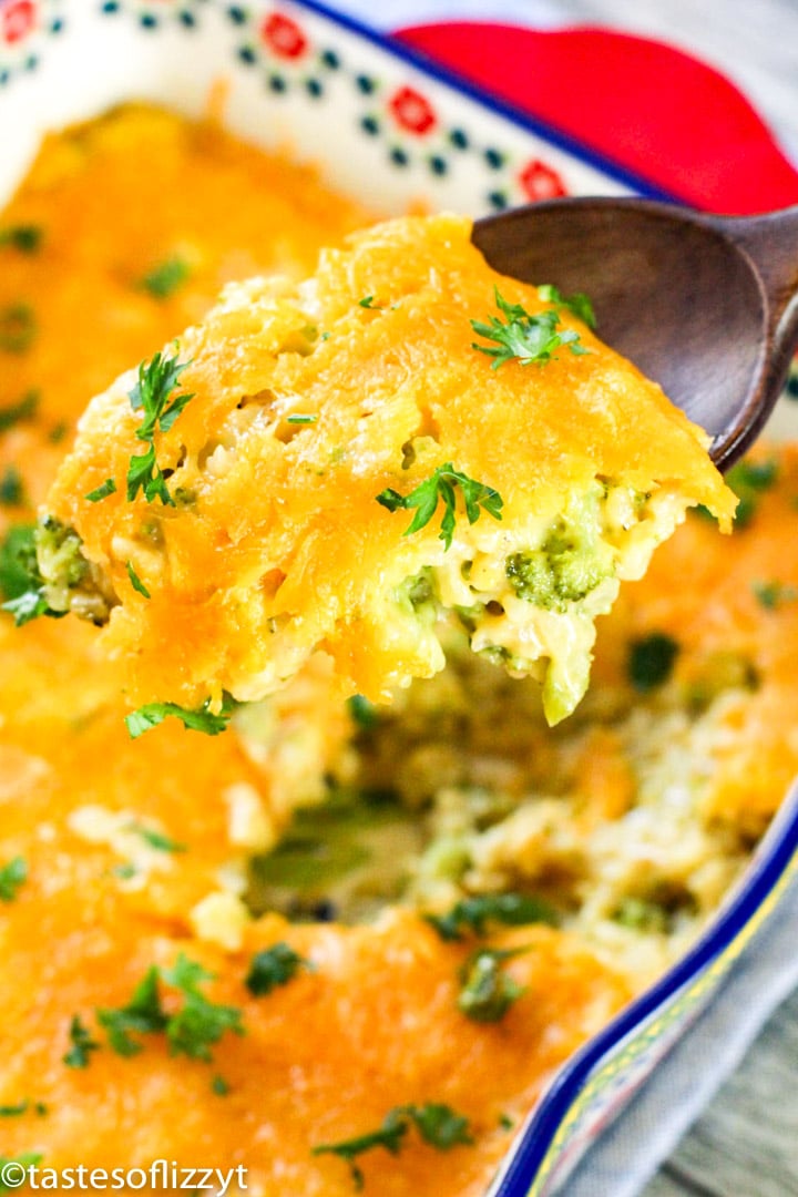 A close up of broccoli casserole on a spoon