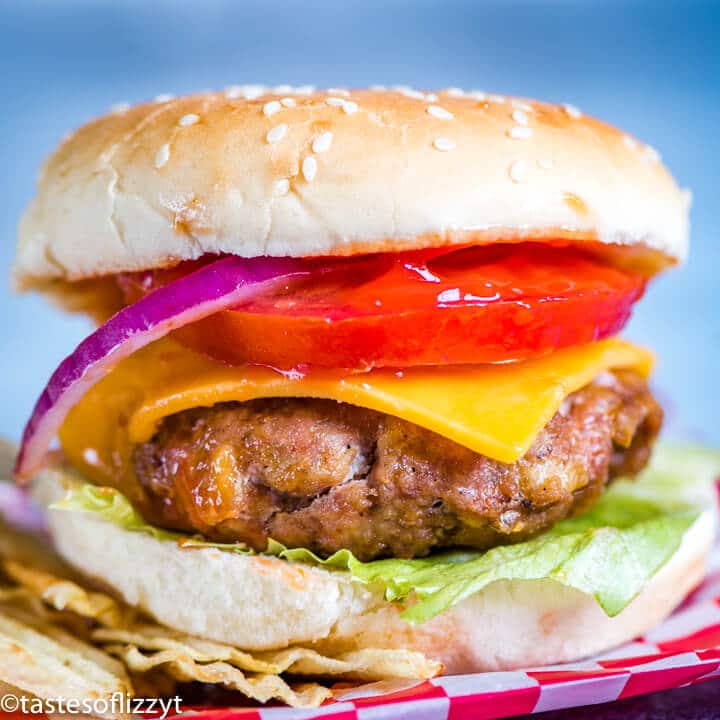 A close up of a sandwich on a plate, with Turkey Burger