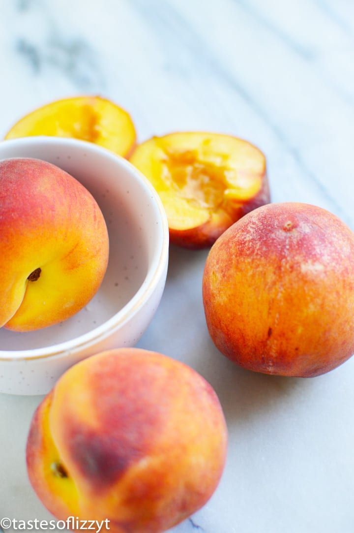 peaches on a cutting board