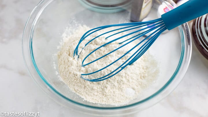 flour in a mixing bowl with whisk