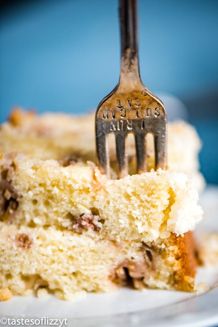 fork in a piece of rhubarb bread