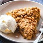 Rhubarb Pie on a plate with ice cream