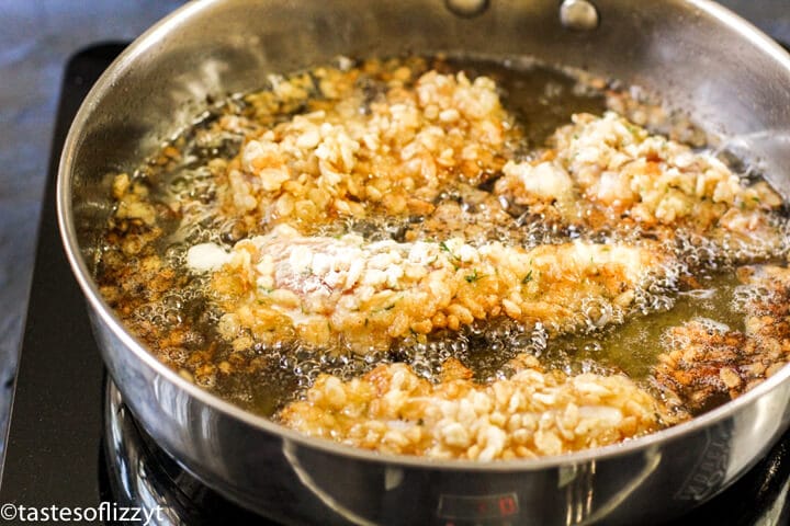 rice krispies chicken tenders frying in oil
