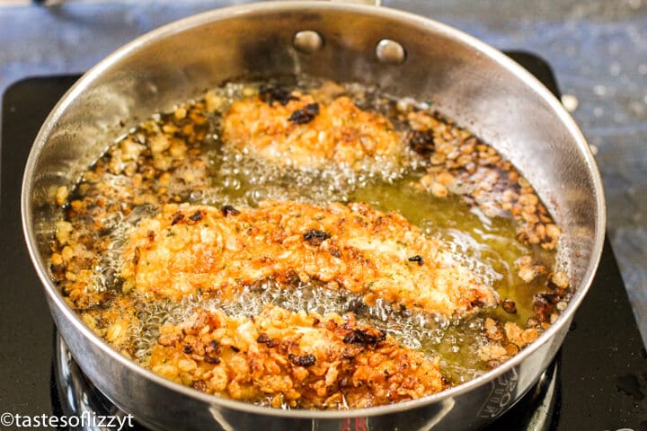rice krispies chicken tenders frying in oil