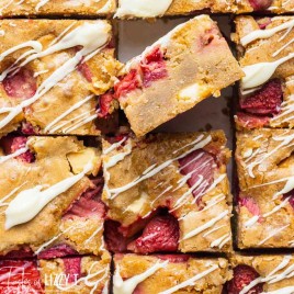 cut strawberry blondie bars with white chocolate