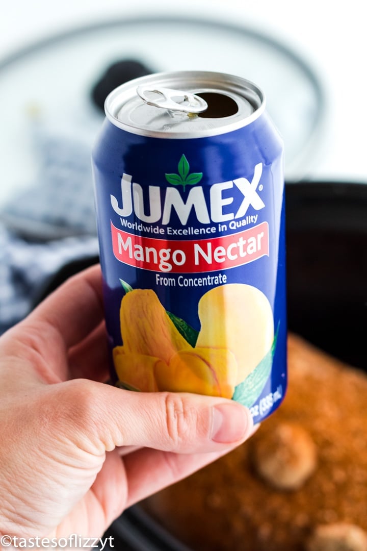 A close up of a can of mango nectar