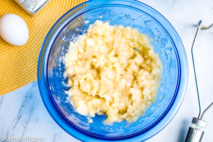 mashed bananas in mixing bowl