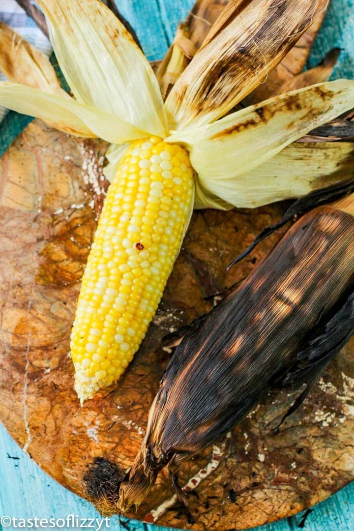 an ear of corn with husks off