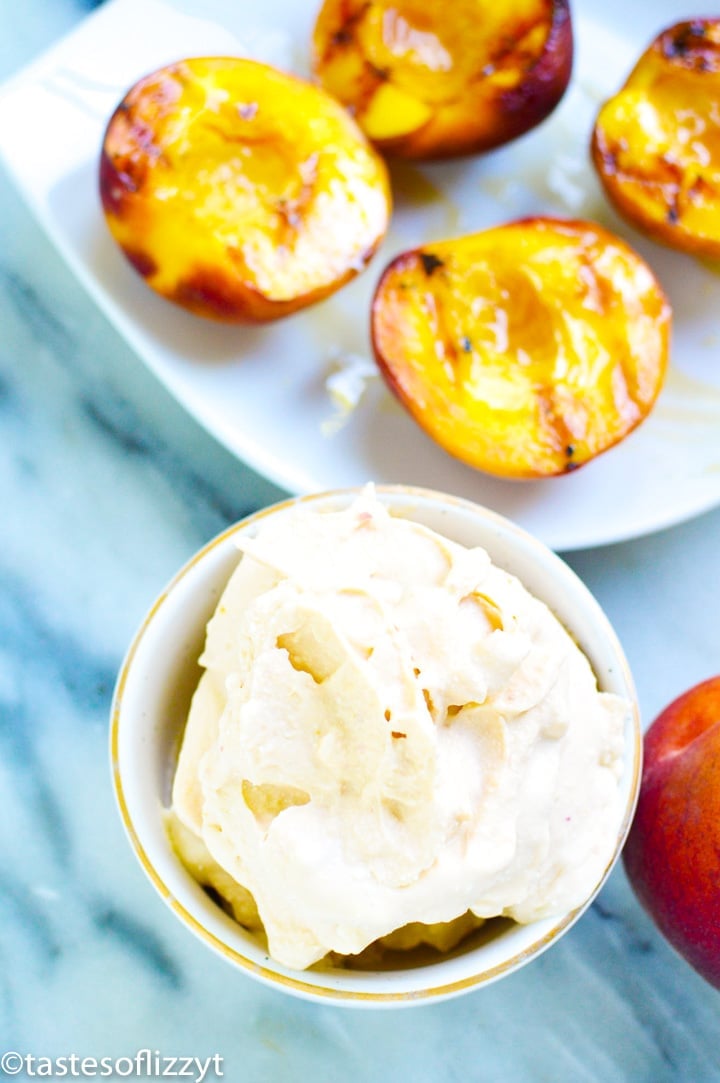 a bowl of peach ice cream