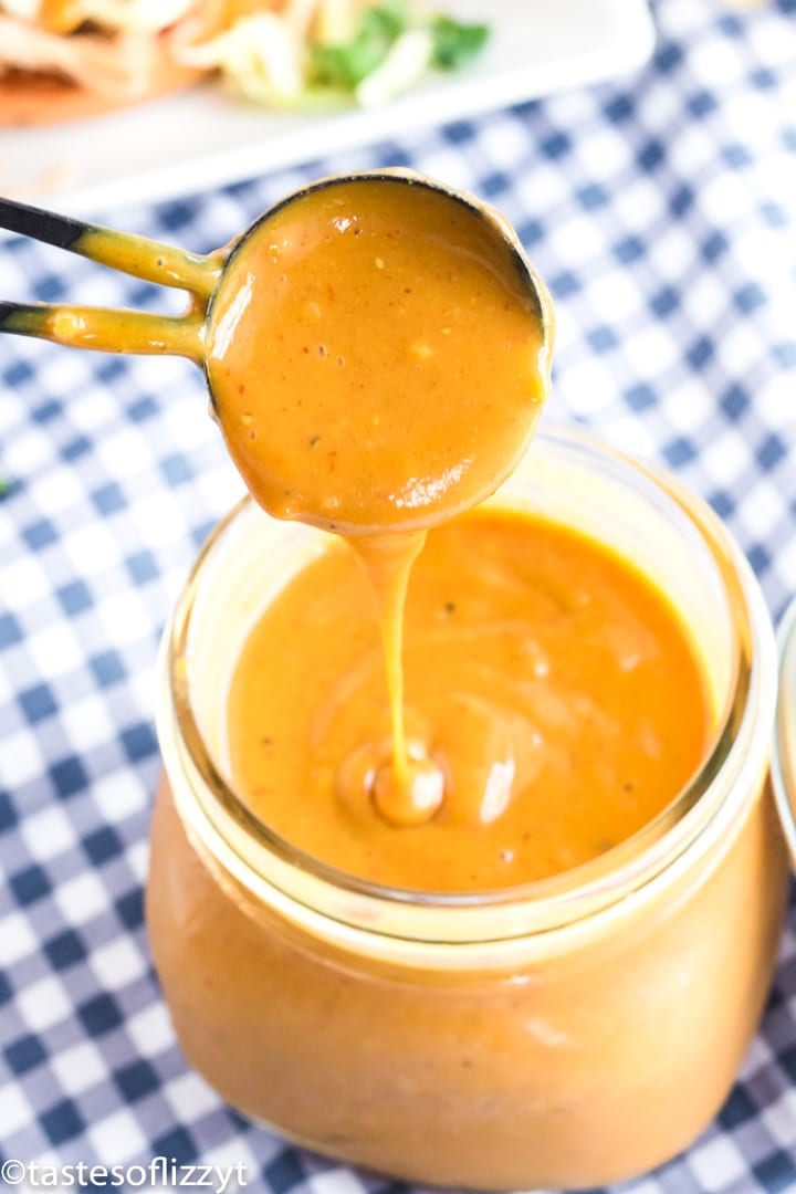 mustard bbq sauce in measuring spoon