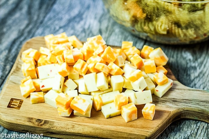 cut cheese on a cutting board