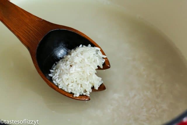 rice on a wooden spoon