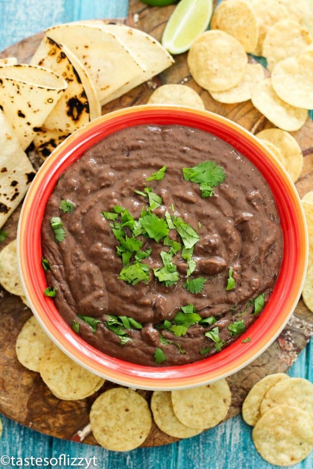 A close up of a bowl of refried beans