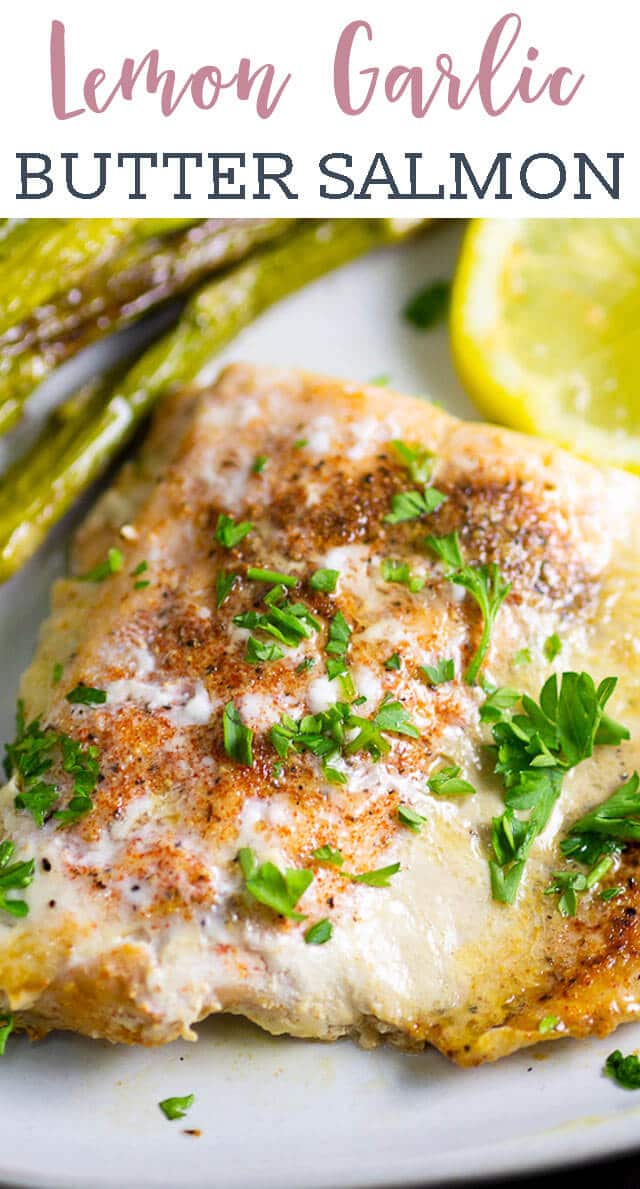 A close up of a plate of food with asparagus and salmon