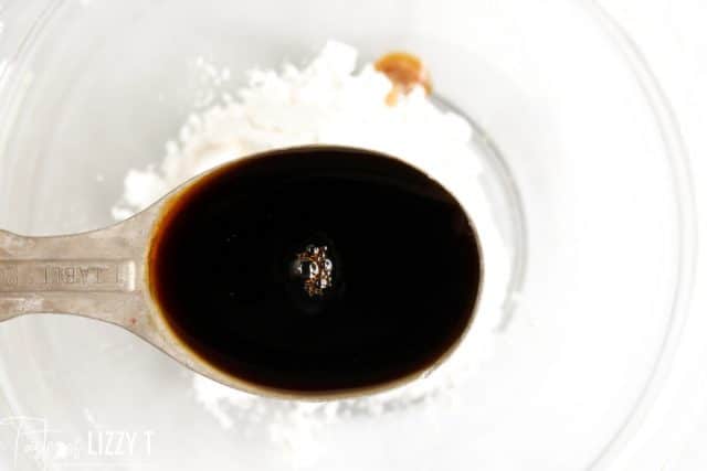 soy Sauce in a measuring spoon