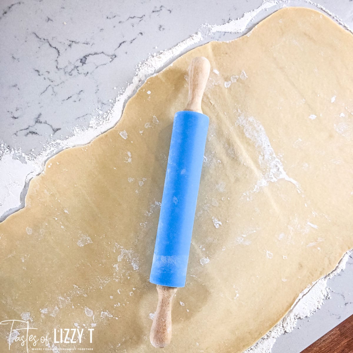 dough rolled out with rolling pin