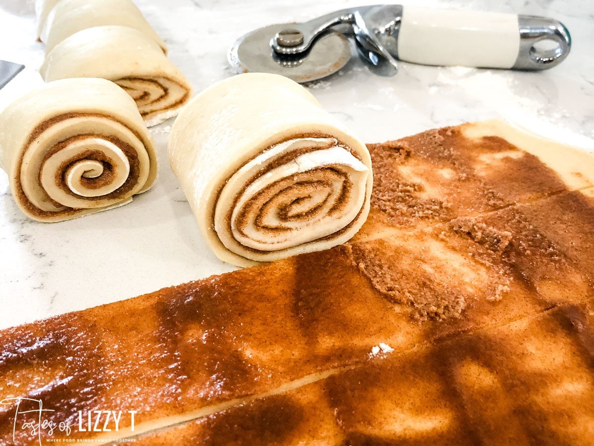 rolling cinnamon rolls