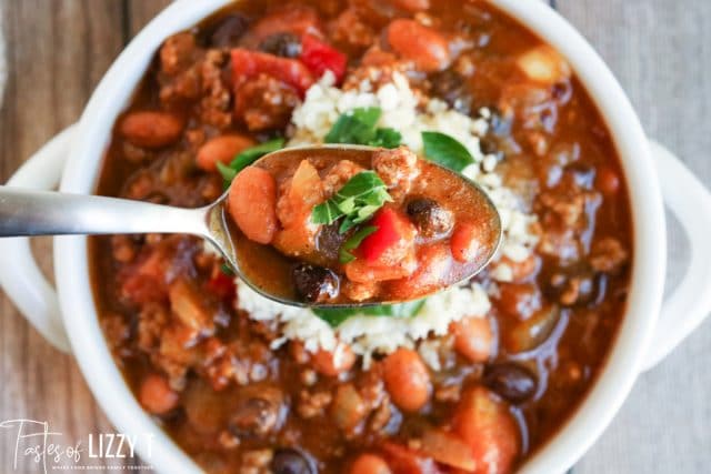 bowl of soup with a bite on a spooon