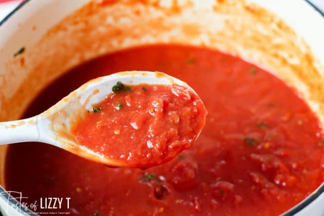 A close up of a bowl of tomato soup