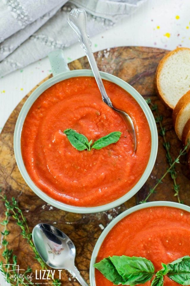 A overhead view of bowl of tomato soup