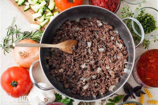 browned hamburger and onion in a saucepan