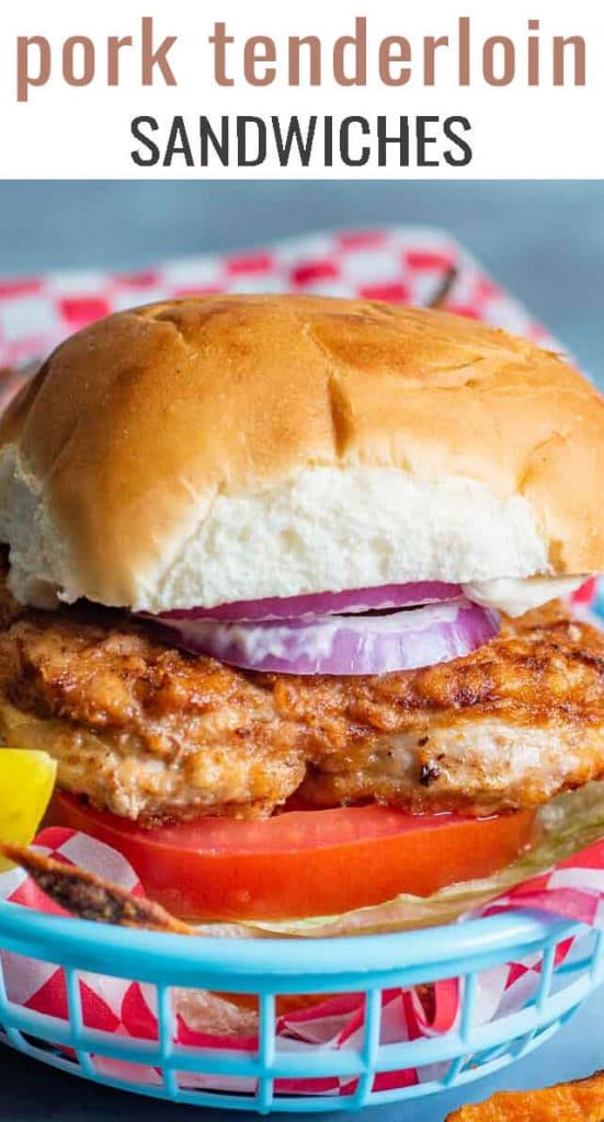 A sandwich sitting on top of a paper plate, with Pork tenderloin