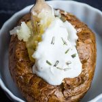 Air Fryer Baked Potato with sour cream and butter