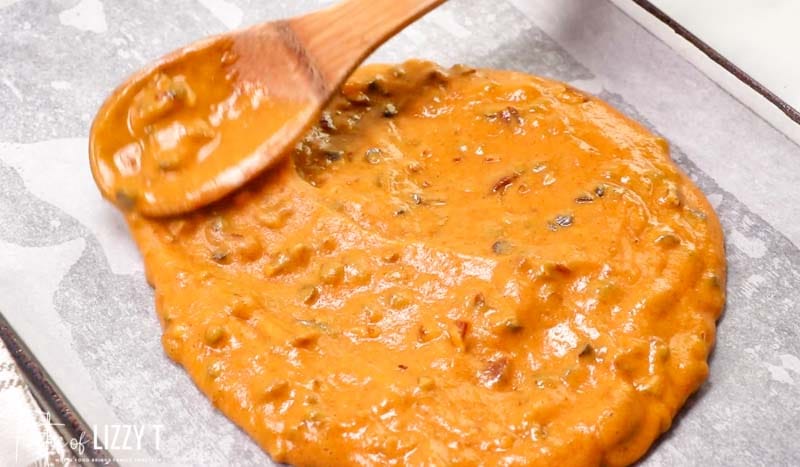 spreading pumpkin batter in a pan