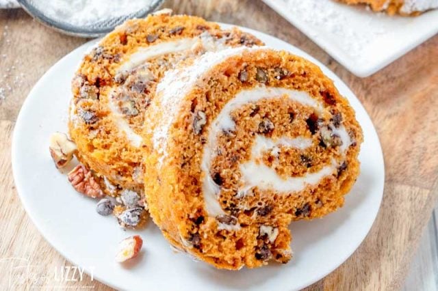 two slices of Chocolate Pecan Pumpkin Roll