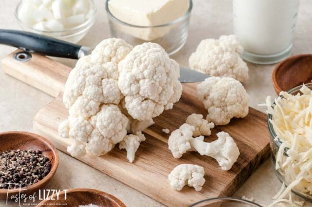 chopped cauliflower on a cutting board