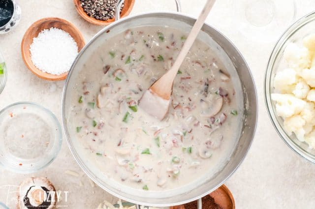 saucepan with creamy mushroom sauce