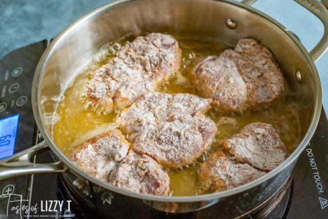 frying pork tenderloin in a skillet