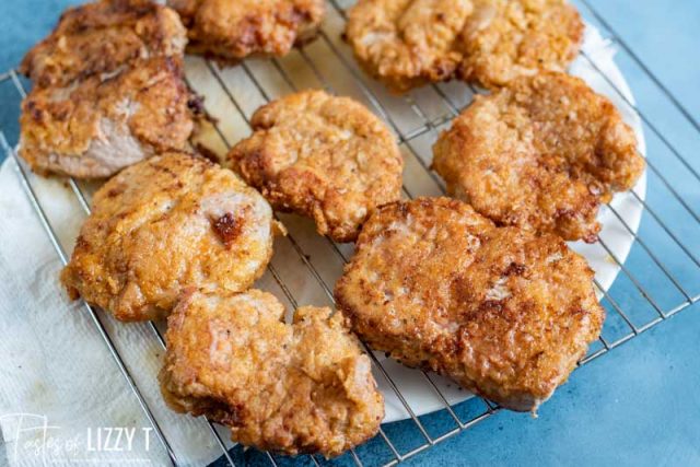 fried pork tenderloin on a wire rack