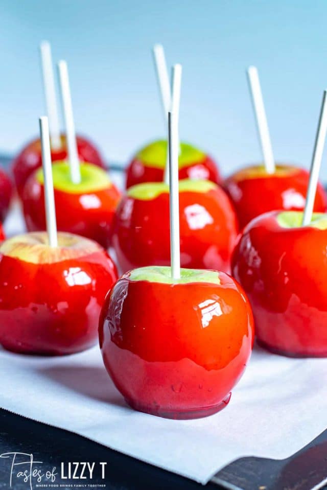 candied apples on parchment paper