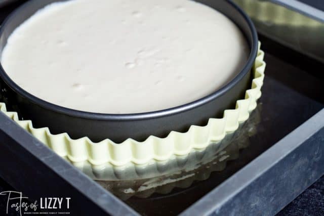 unbaked cheesecake in water bath