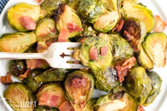 A close up of food, with Bacon and Brussels sprout
