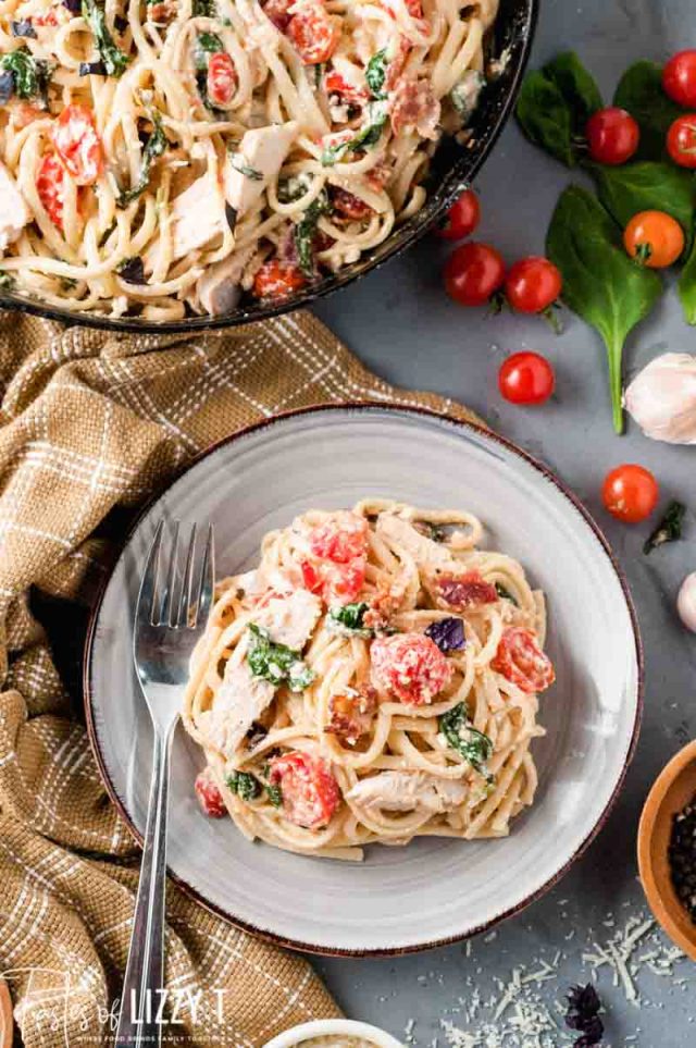 A plate of food on a table, with Chicken and Pasta