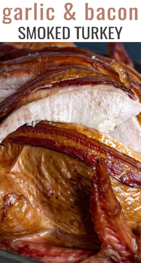 You've never had a turkey like this! Fire up the smoker and make this Smoked Turkey with Garlic and Bacon. It's so juicy and has amazing flavor!