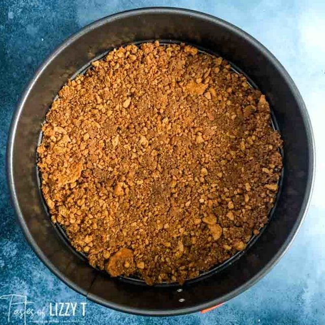 gingersnap crumbs in a springform pan