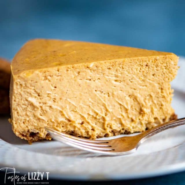 A piece of pumpkin cheesecake on a plate