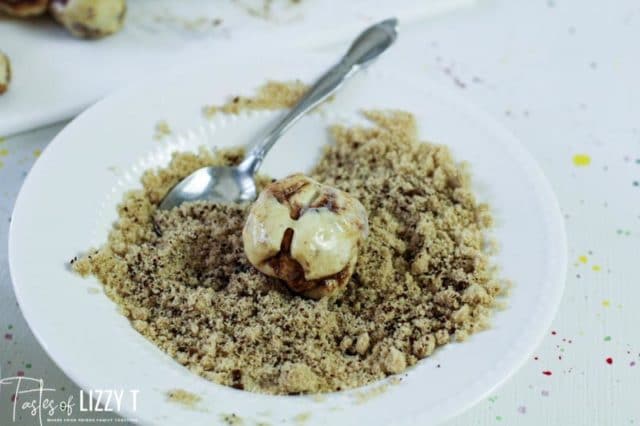 rolling dough in crumbs