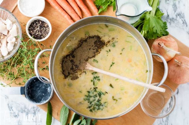 soup broth with spices in a pan