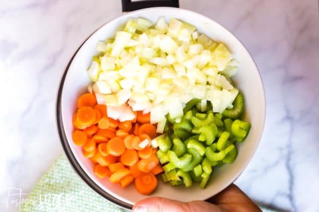 pan with onions, celery and carrots